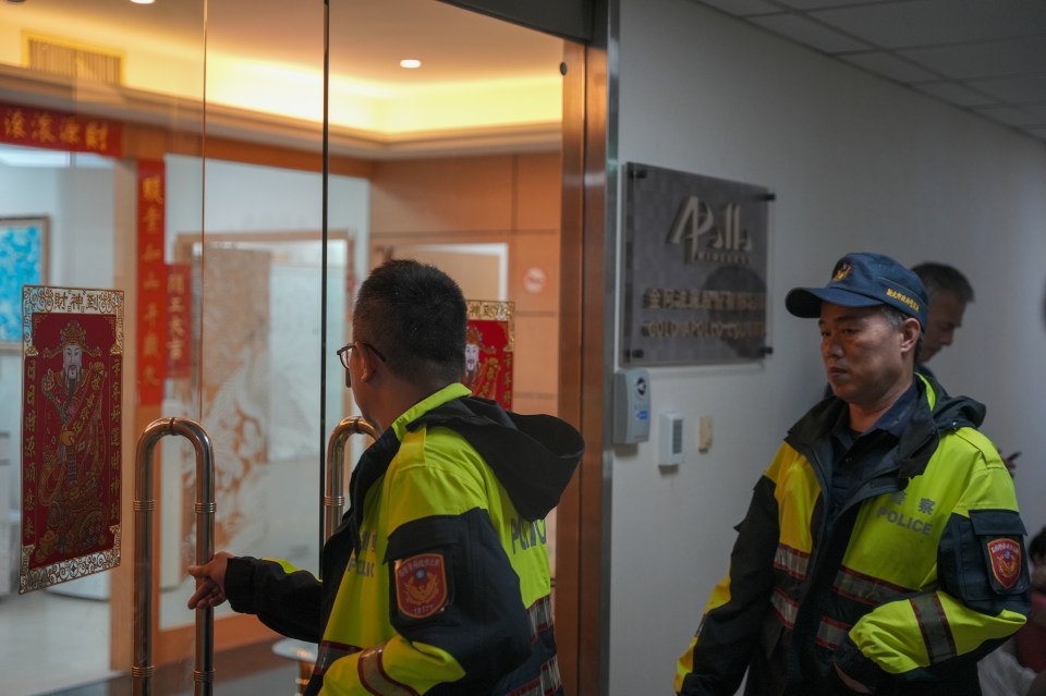 a man in a blue hat with the word police on it