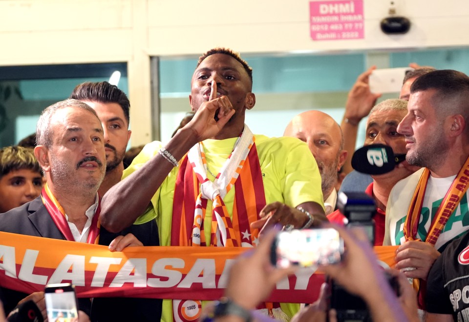 The striker led fans in a chant before completing his move to the Turkish giants