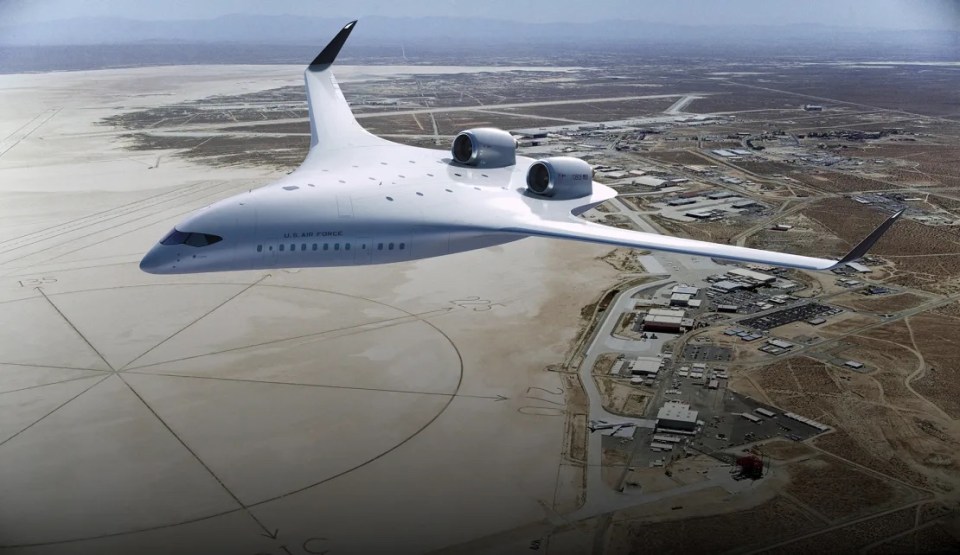 a u.s. air force plane is flying over a desert