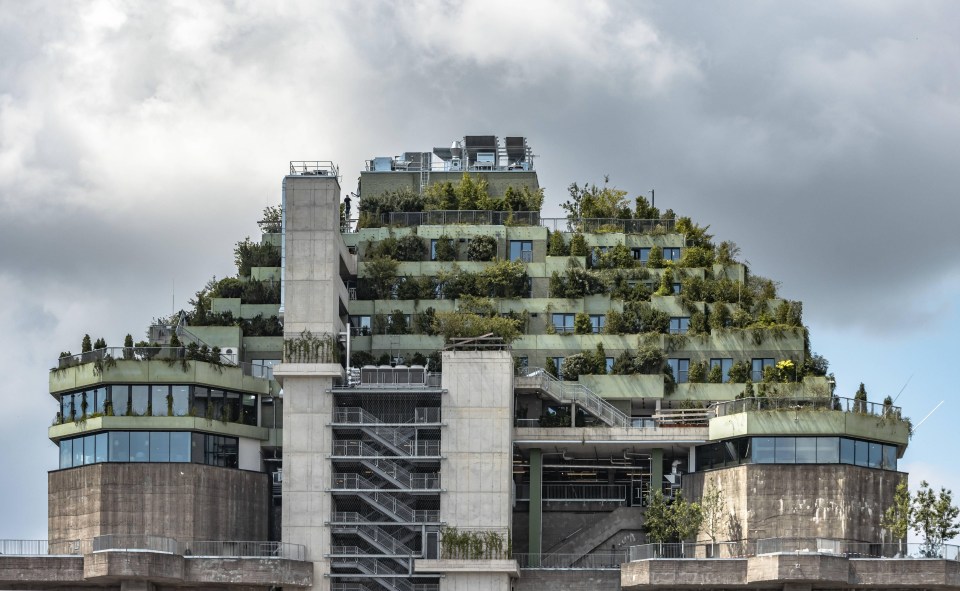 a large building with a lot of windows and balconies