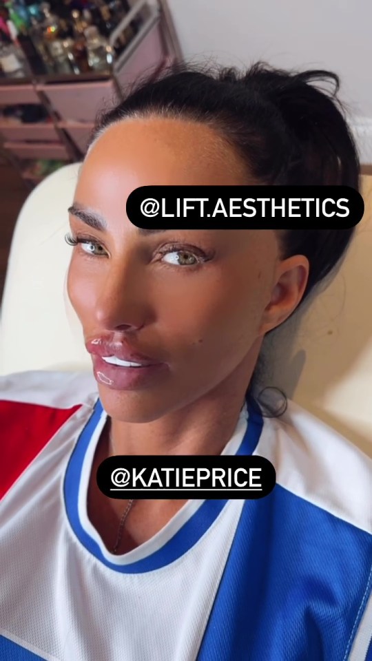 a woman wearing a blue and white shirt with the name katie price on it