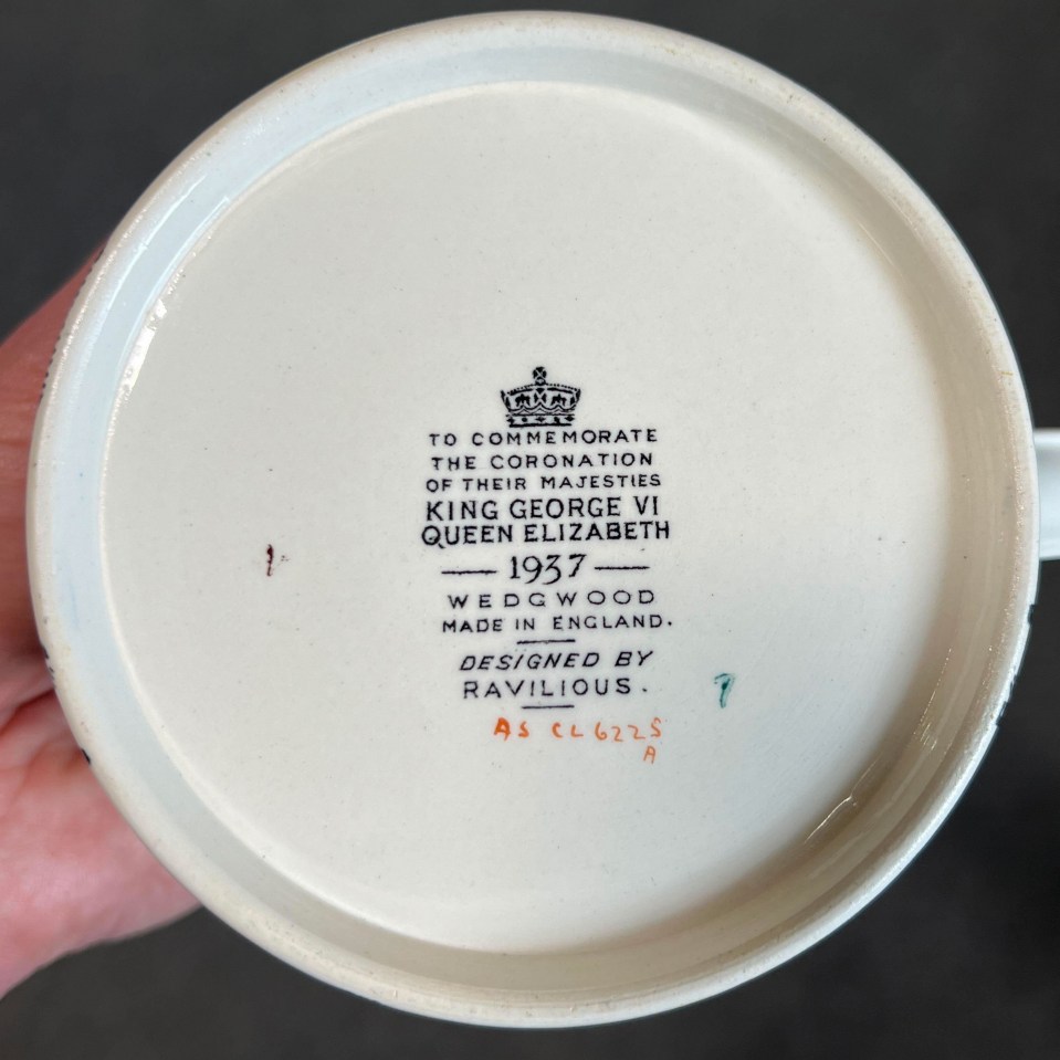 a white mug with the words to commemorate the coronation of their majesties king george vi queen elizabeth