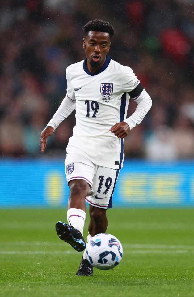 a soccer player with the number 19 on his jersey