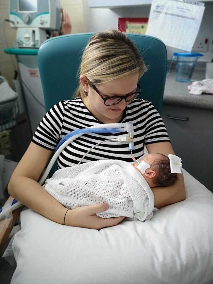 Keira Smith holding little Mali, who died three days after being born