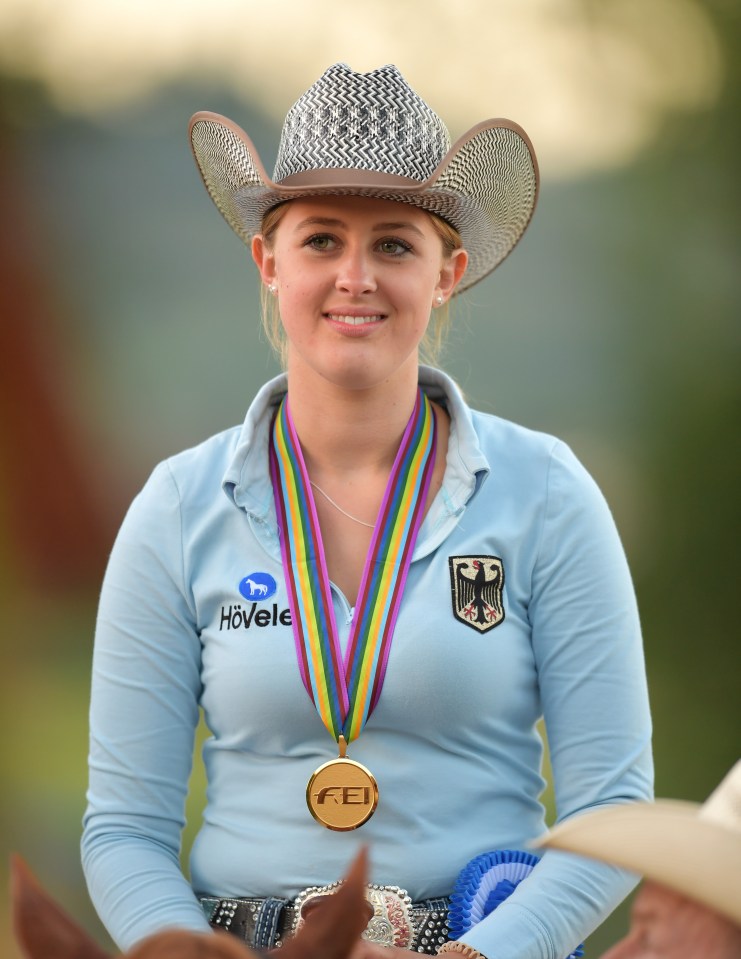 GIVRINS, SWITZERLAND - AUGUST 12: Gina Schumacher of Germany celebrates her victory after the SVAG FEI European Championship Reining Young riders 2016 at the CS Ranch on August 12, 2016 in Givrins, Switzerland. (Photo by Harold Cunningham/Getty Images)