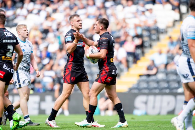 a rugby player with the number 2 on his shorts