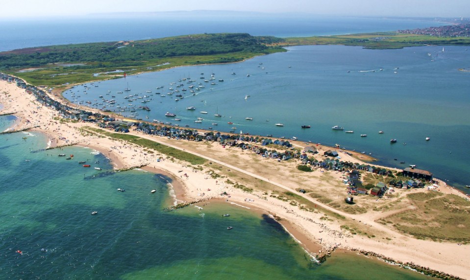 The beach hut sits on a stunning sandbank