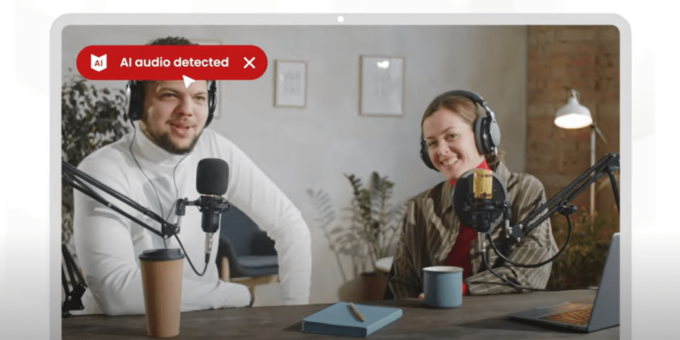 a man and a woman are sitting in front of microphones with a red box that says " ai audio detected "