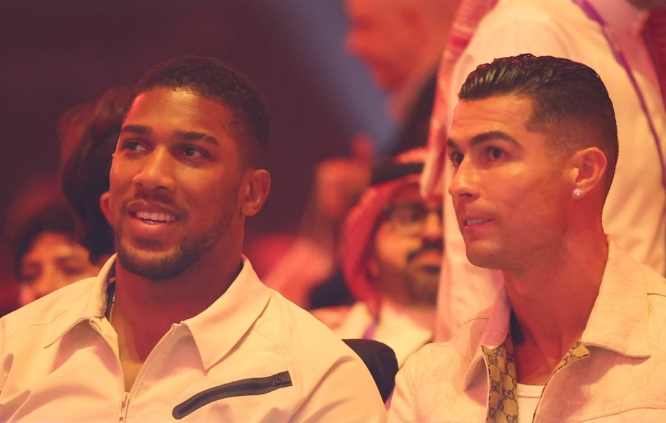 AJ watch Fury's defeat to Usyk sat alongside Cristiano Ronaldo