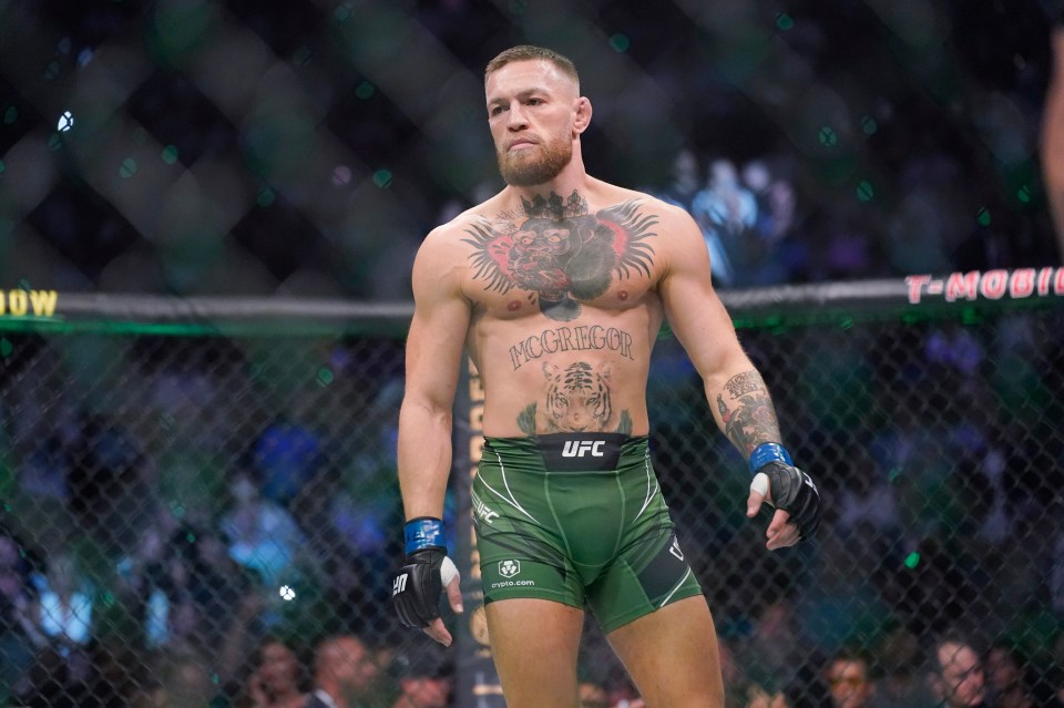 a man with a tattoo on his chest that says mcgregor