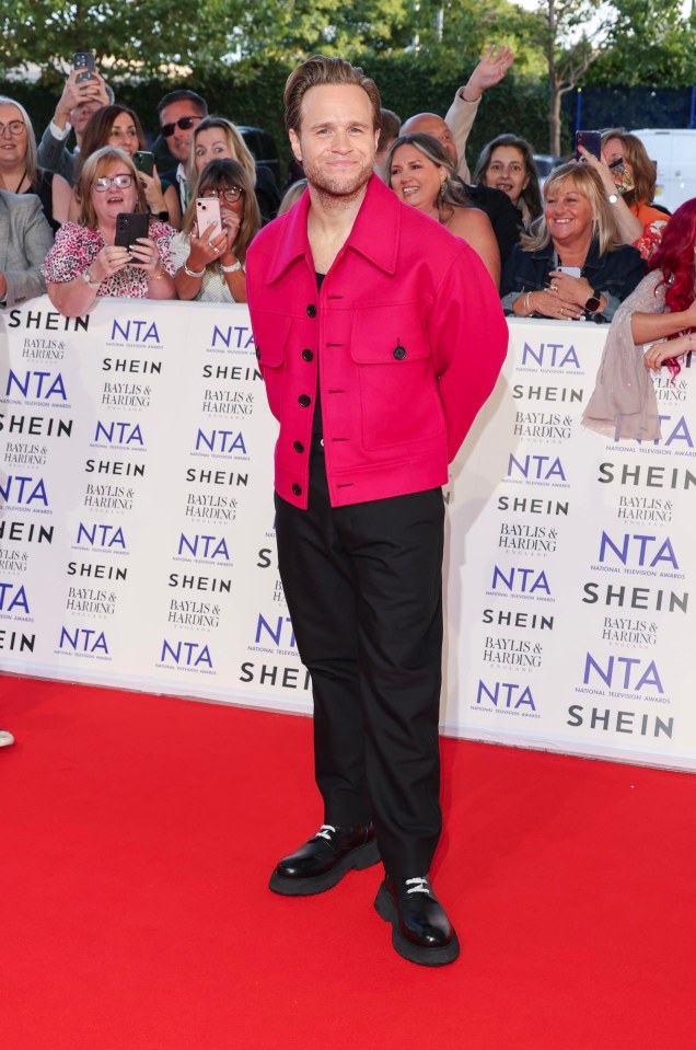 Singer Olly Murs made a statement in a pink jacket