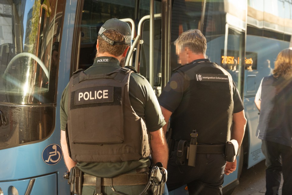 Officers head on board to catch the pair after the coach arrives in Belfast