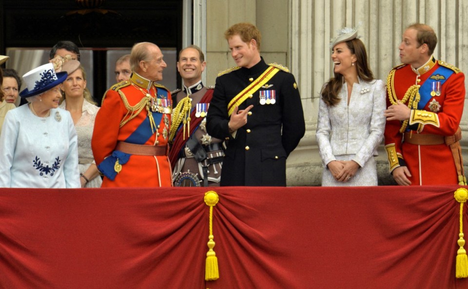 Harry is pictured on the Buckingham Palace balcony alongside his family on his 30th birthday