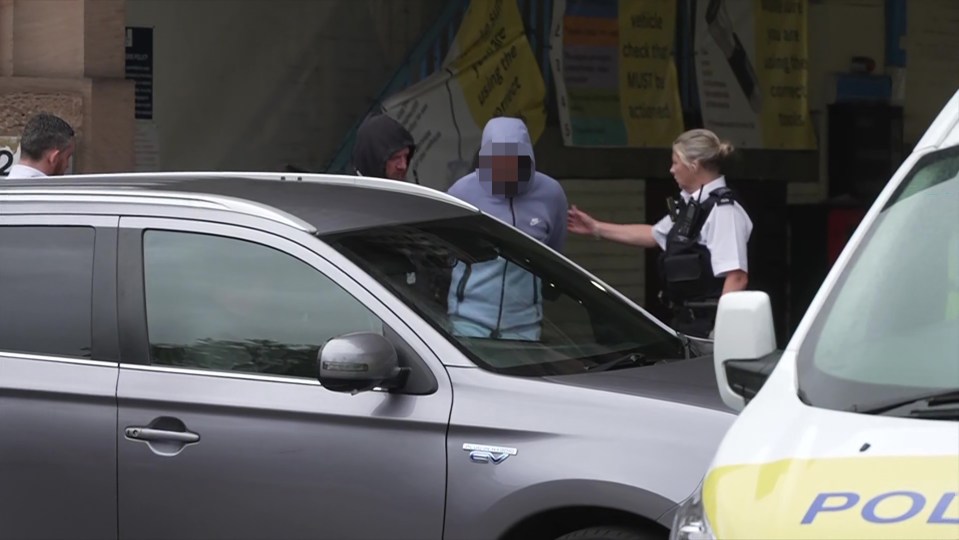 Cops cuffed him and let him into a waiting van