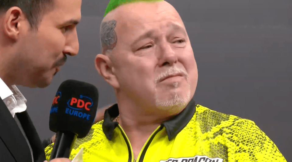 Peter Wright broke down in tears at the German Darts Championship