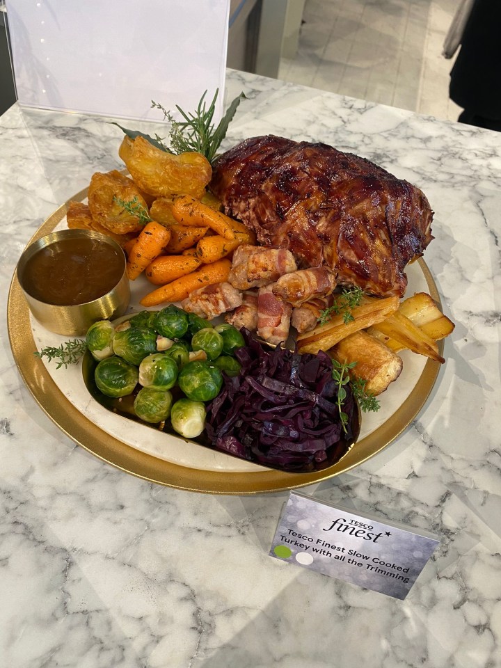 a plate of food with a sign that says ' finest ' on it