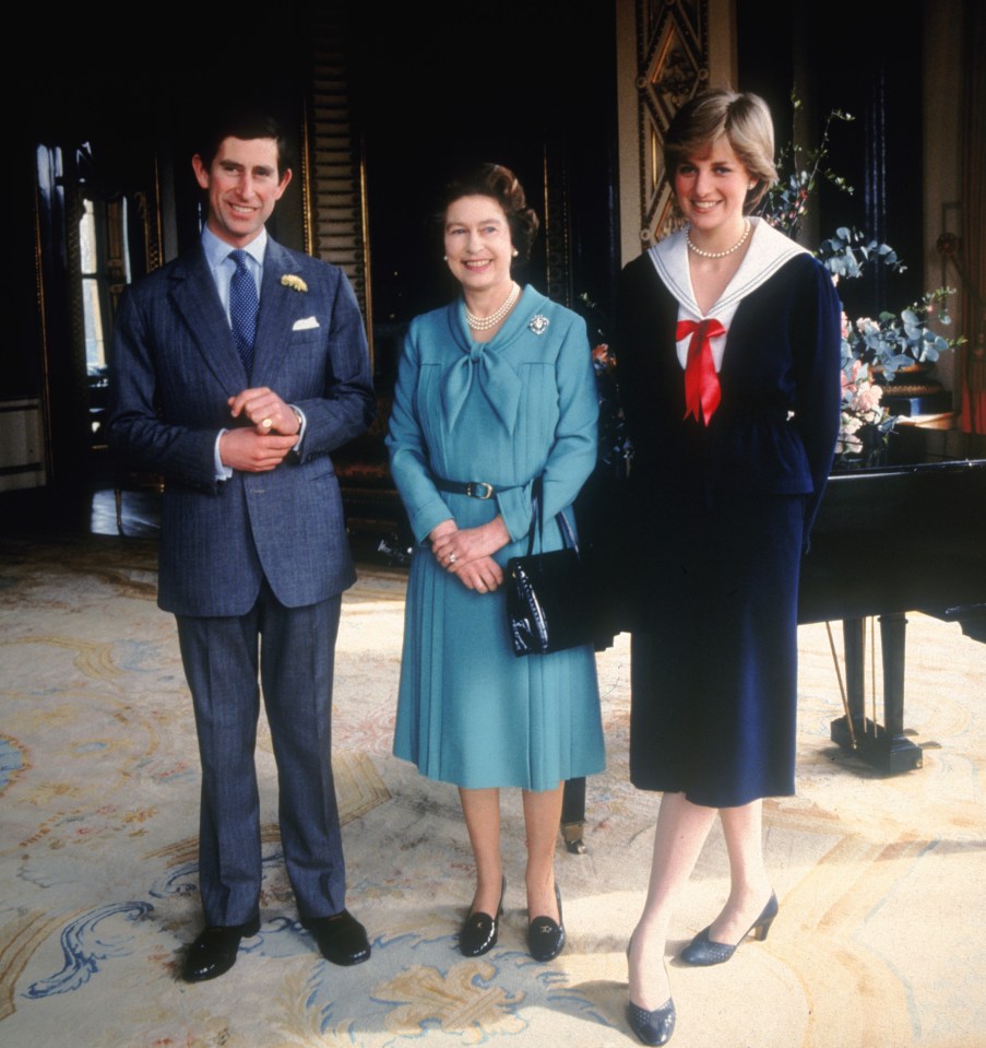 queen elizabeth ii princess diana and prince charles pose for a photo