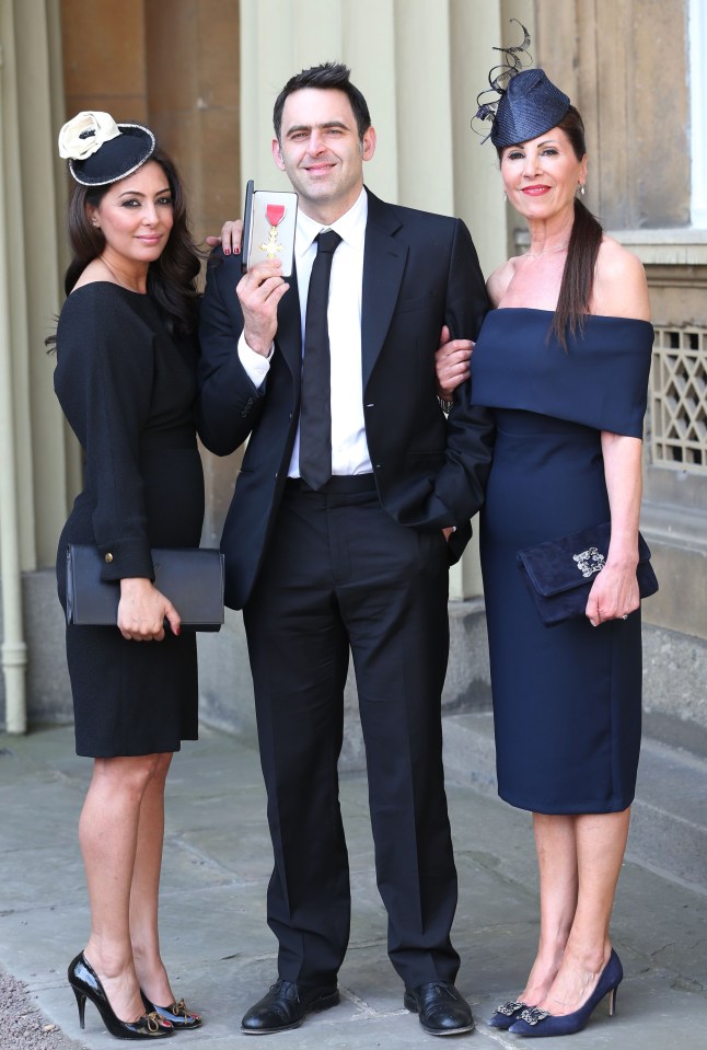 Ronnie with Laila and his mother Maria O’Sullivan with his OBE at Buckingham Palace in 2016