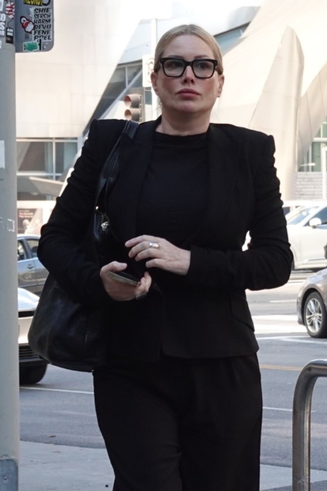 Alice Evans, pictured on Monday, was kicked out of an LA courtroom after taking pictures of her ex-husband during their child support hearing