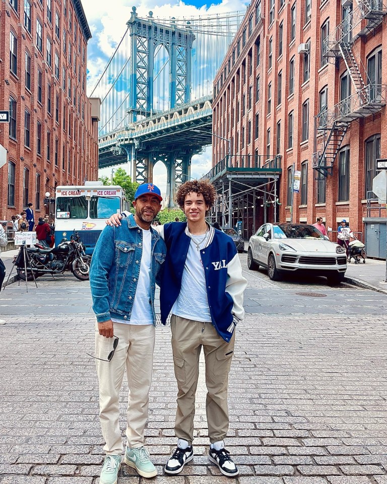 two men standing in front of an ice cream truck