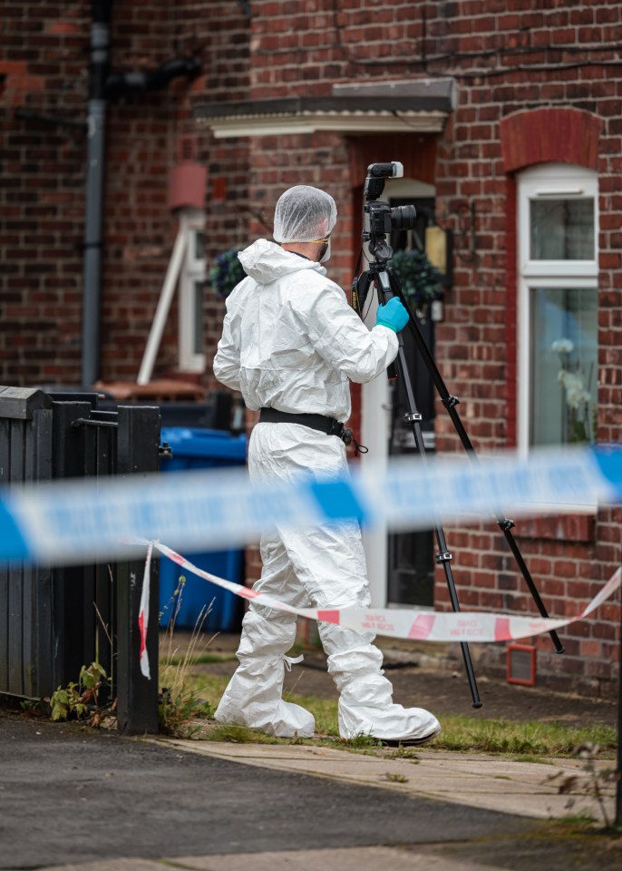 A forensic officer at the scene