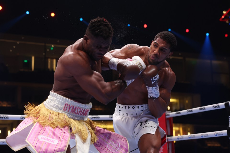 two boxers in a ring with one wearing gymshark shorts