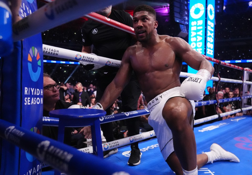 a boxer in a ring with a sign that says riyadh season