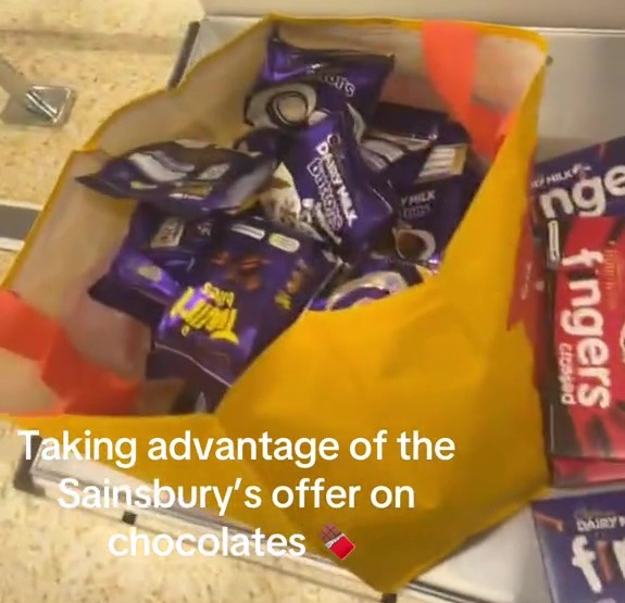 She showed her bag full of chocolate in Sainsbury's