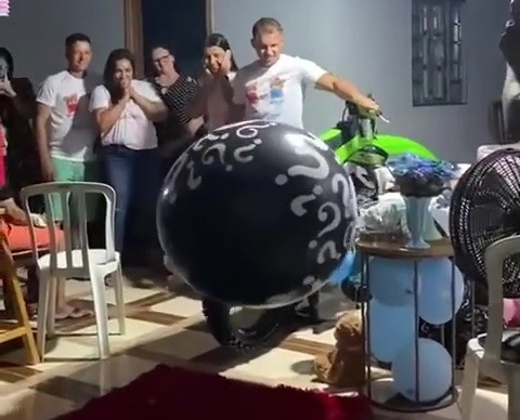 A couple has been slammed for their "stupid" gender reveal, which involved a bike exhaust inflating a huge balloon