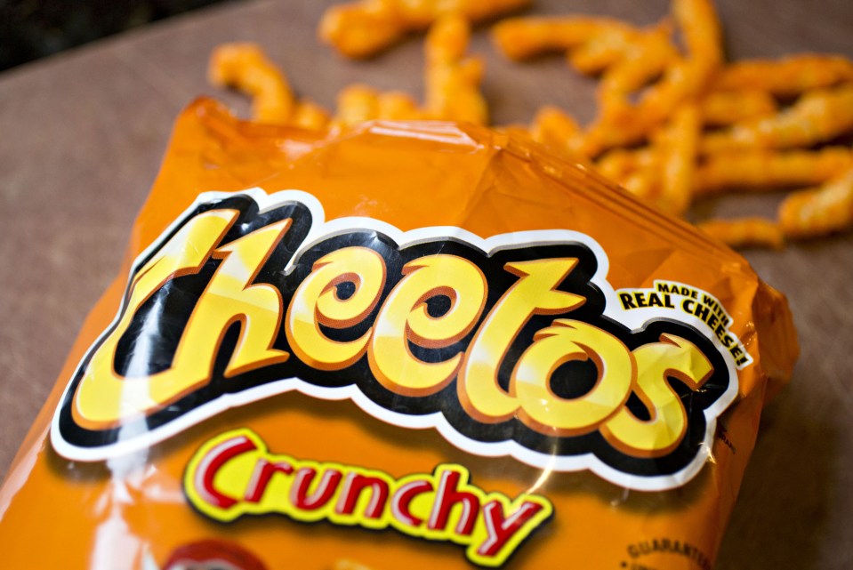 a bag of cheetos crunchy chips on a table