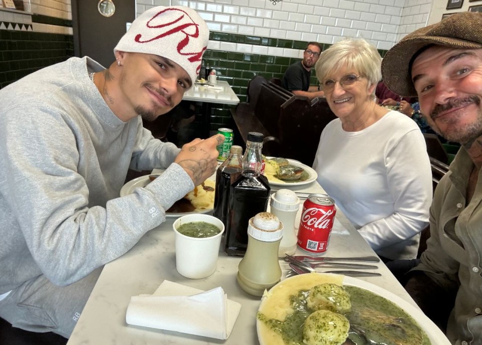 David Beckham posed for a selfie with his mum Sandra and son Romeo at a pie and mash shop