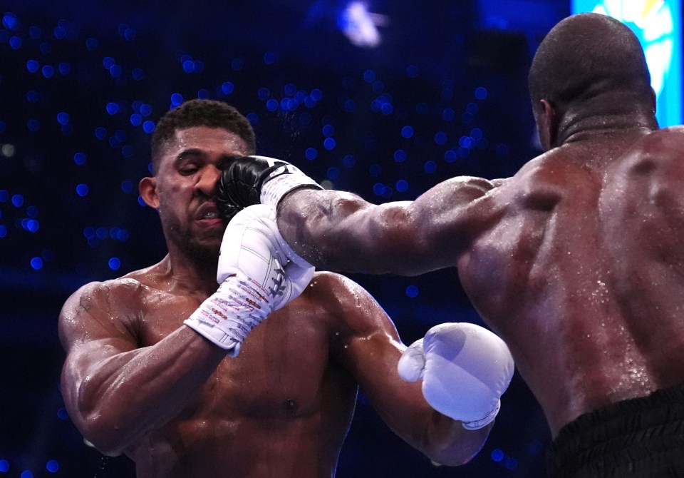 Joshua was unable to stand Dynamite's barrage of power punches