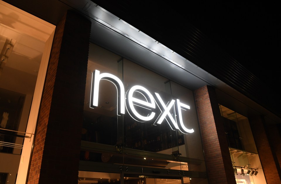 a next store is lit up at night