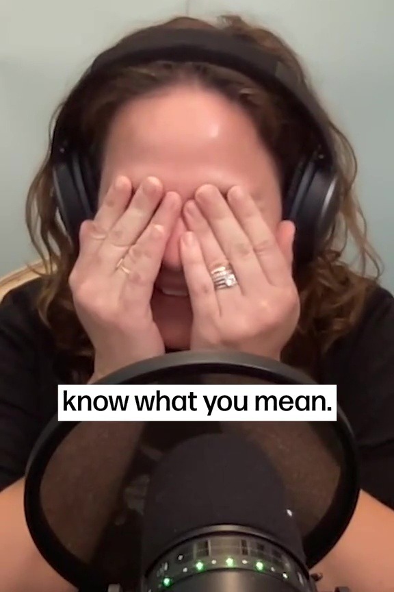 a woman wearing headphones covering her face with her hands and the words know what you mean below her