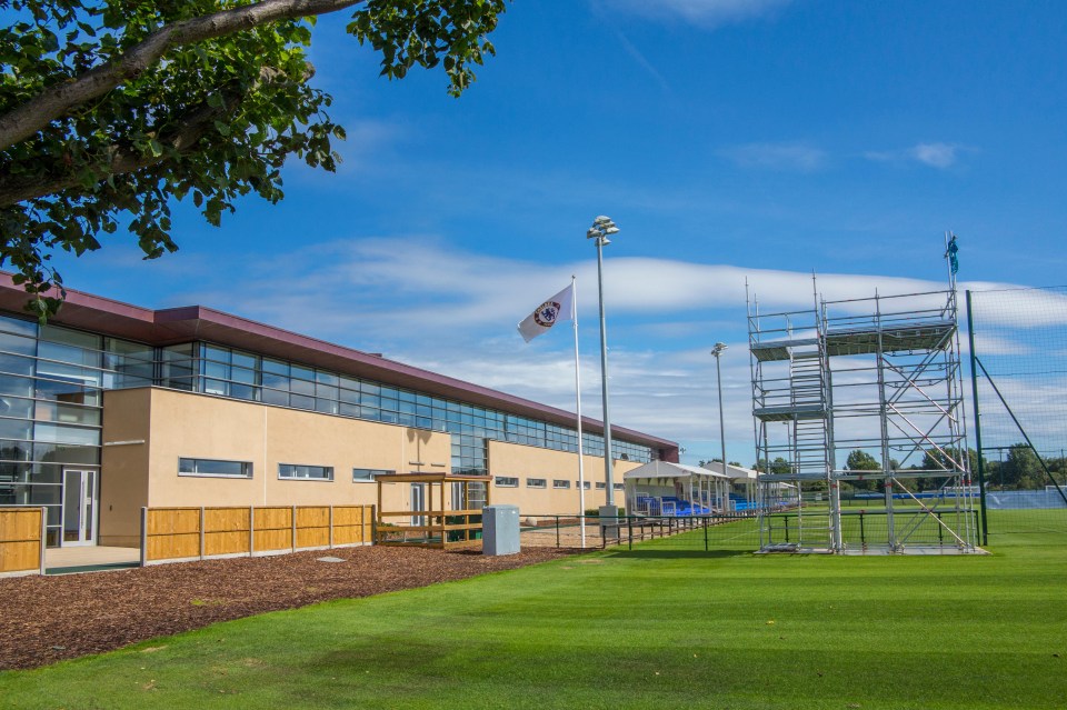 a large building with a flag that says ' fc ' on it