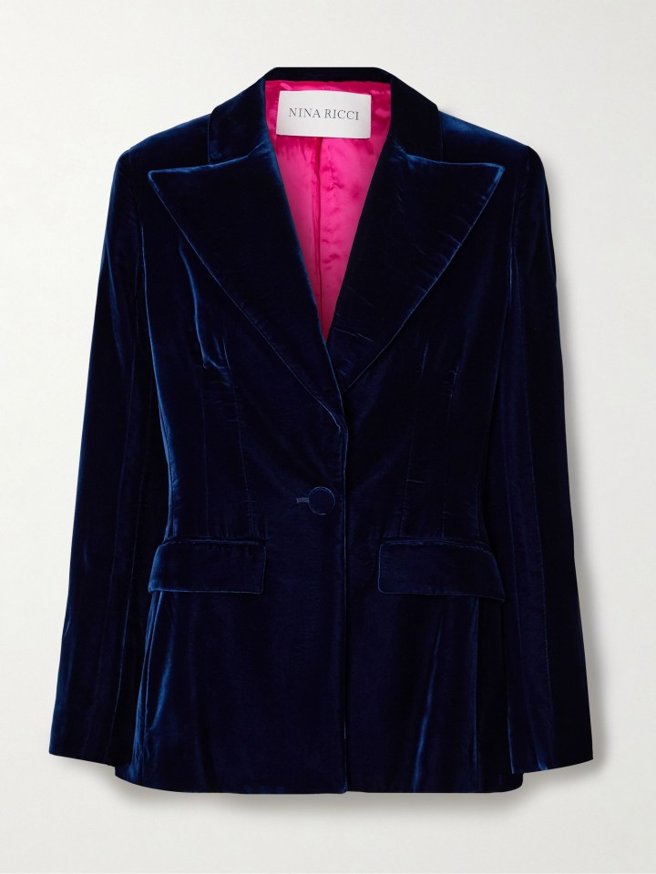 a blue velvet jacket by nina ricci with a pink lining