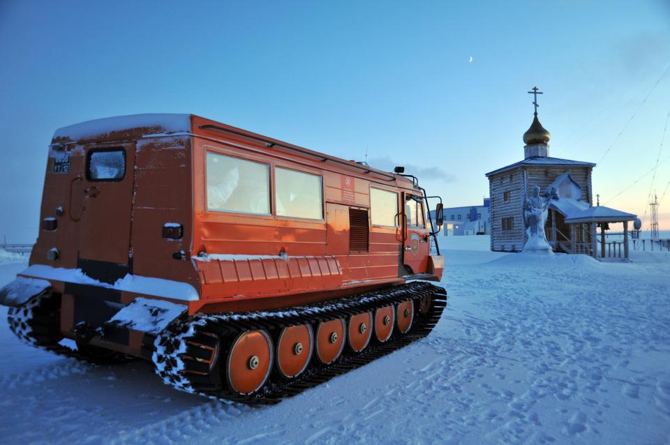 An ice truck approaches a home in Novaya Zemlya