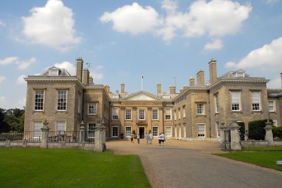 a large building with a flag on top of it