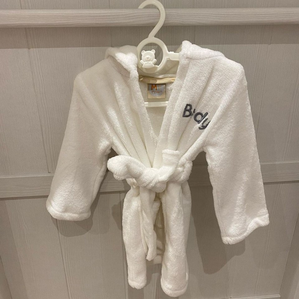 Brody even has a sweet bath robe with his name on