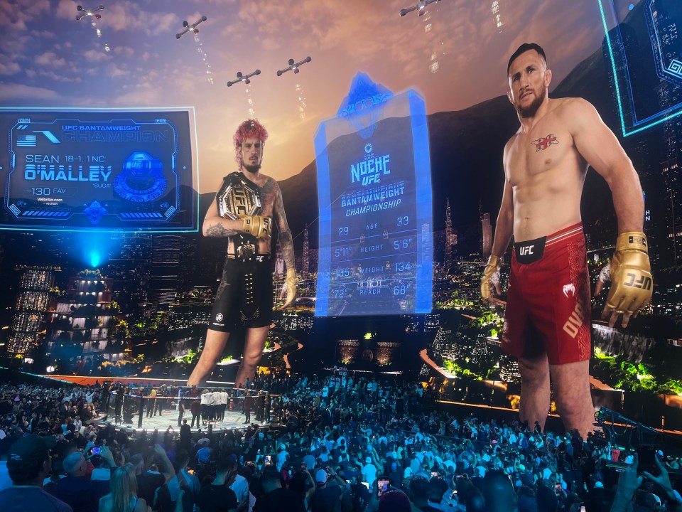 two fighters are standing in front of a screen that says noche ufc