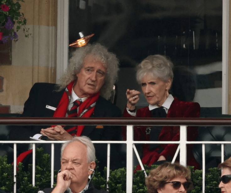 Brian May and actress Anita Dobson watch from the committee room during day two of the 3rd Test Match between England and Sri Lanka at The Kia Oval