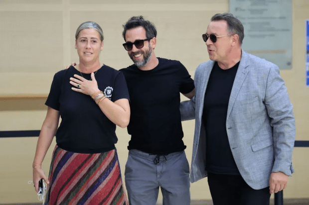 The sons of Gisele Pelicot, Florian (C), David (R) and her daughter Caroline Darian (L) pictured at the criminal court