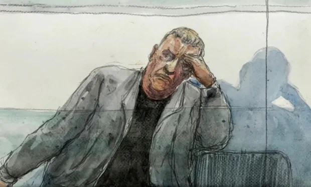 a drawing of a man sitting in a courtroom with his hand on his forehead .