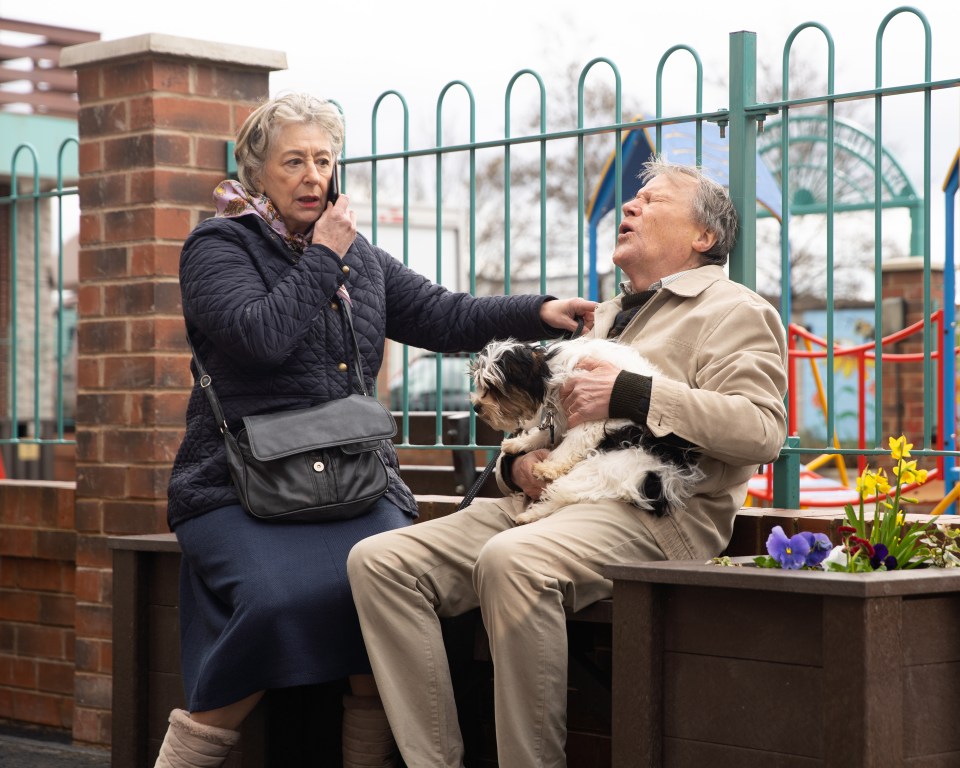 Maureen as Evelyn Plummer in Corrie alongside David Neilson's Roy Cropper