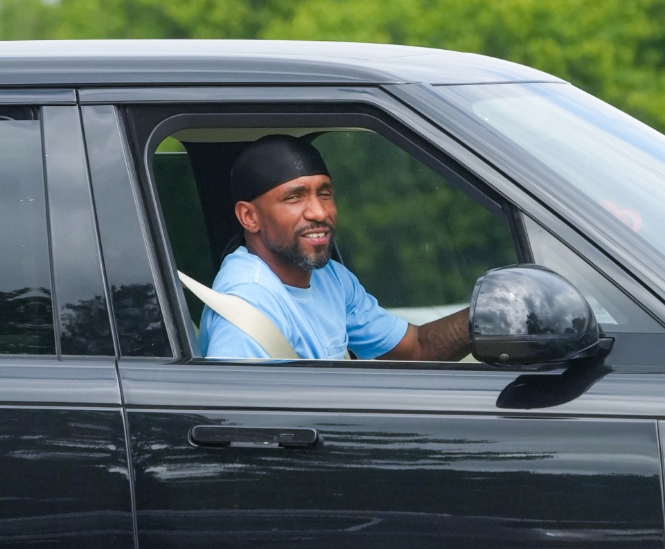 Defoe was all smiles as he arrived and began chatting to the mystery woman