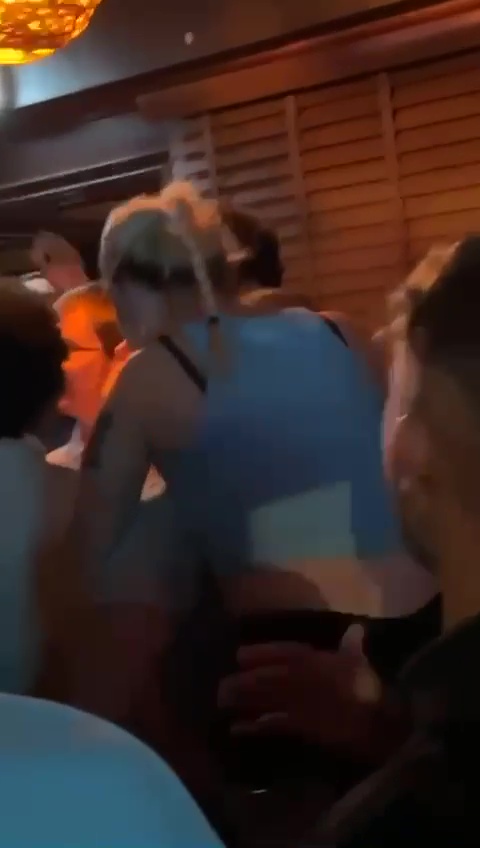 Trippier was filmed hoisting a blonde woman onto his back in the club