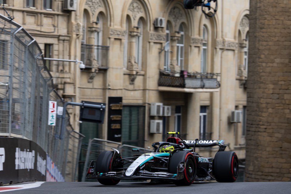 a race car with the word petronas on the side