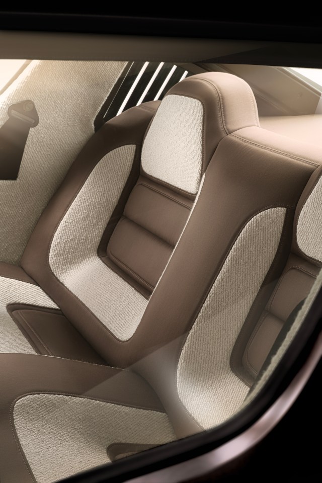 The seats are redesigned around the original 'petal' shape and use beige and brown wool.