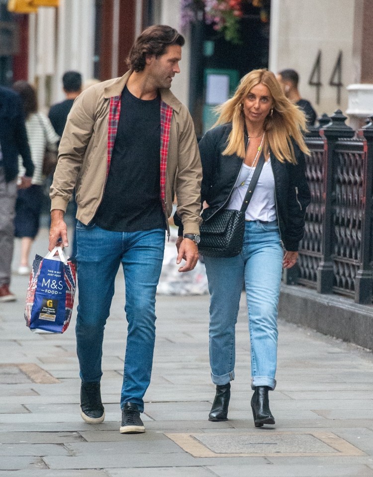 Louise and Drew were spotted walking through central London across the weekend