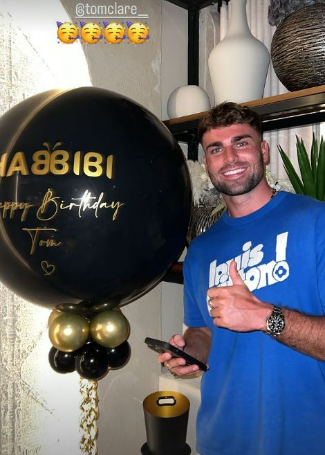 The footballer was presented with a personalised balloon